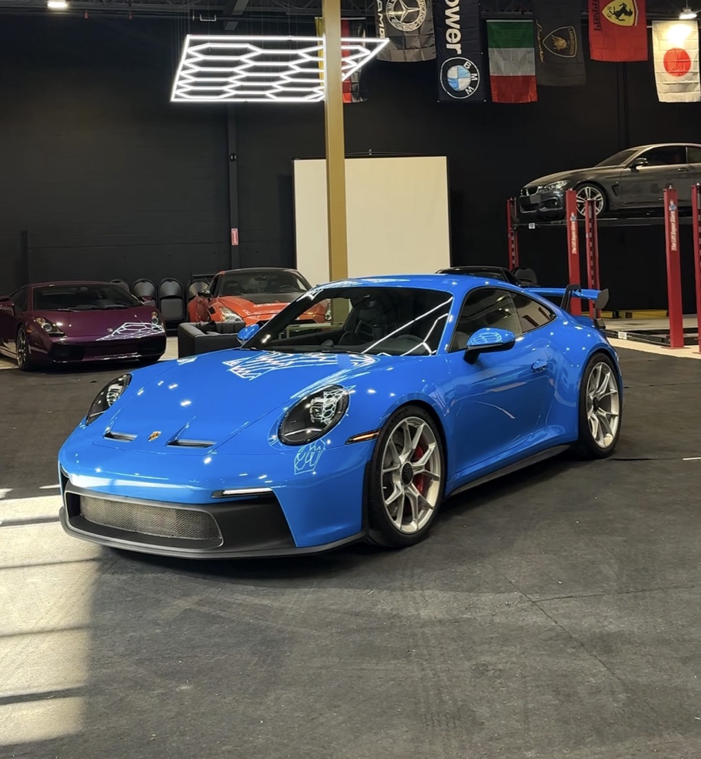 Shark-blue Porsche 911 GT3 after full front paint protection film